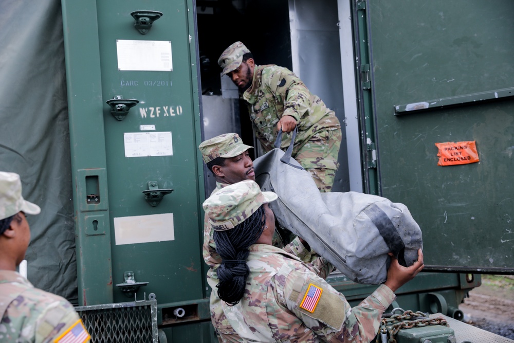 District of Columbia National Guard  Culinary Specialist team up with Pennsylvania National Guard  to work on Containerized Kitchen