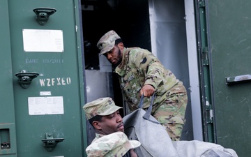 District of Columbia National Guard  Culinary Specialist team up with Pennsylvania National Guard  to work on Containerized Kitchen