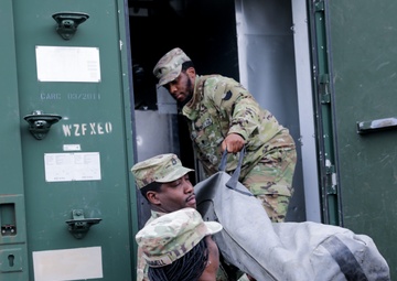 District of Columbia National Guard  Culinary Specialist team up with Pennsylvania National Guard  to work on Containerized Kitchen