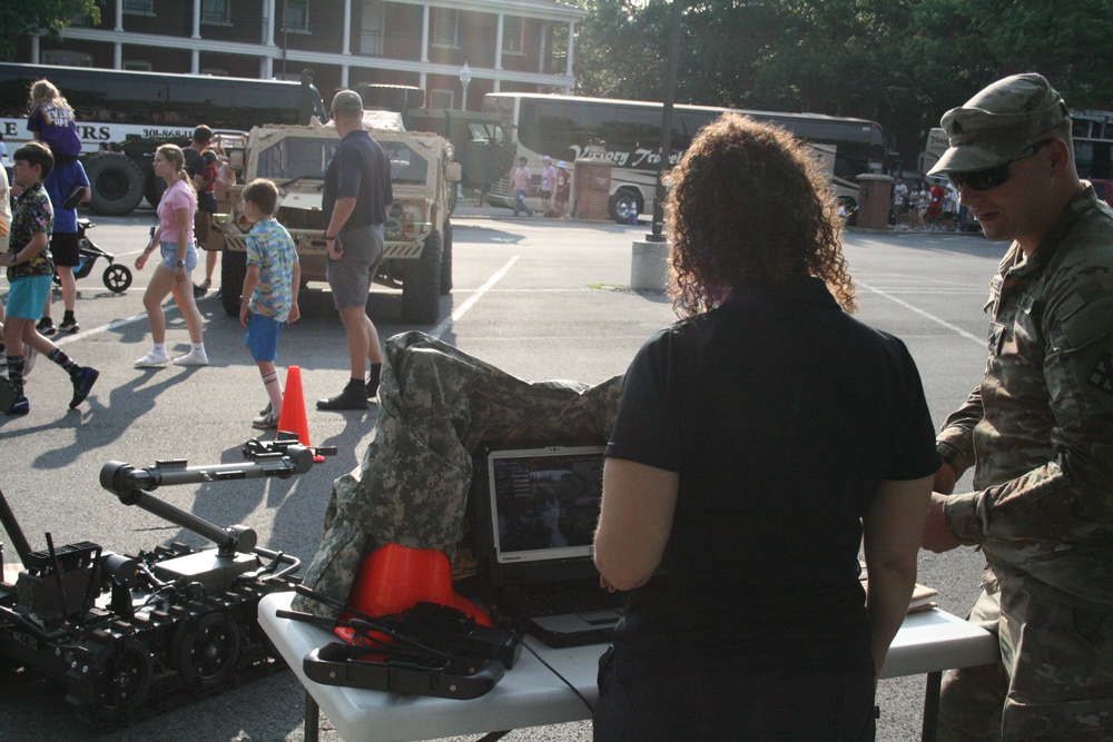 Engineers from the 412th Theater Engineer Command provide equipment displays at the Twilight Tattoo