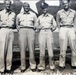 Staff Sgt. Loring E. Lord (second from the left) stands with fellow crew members