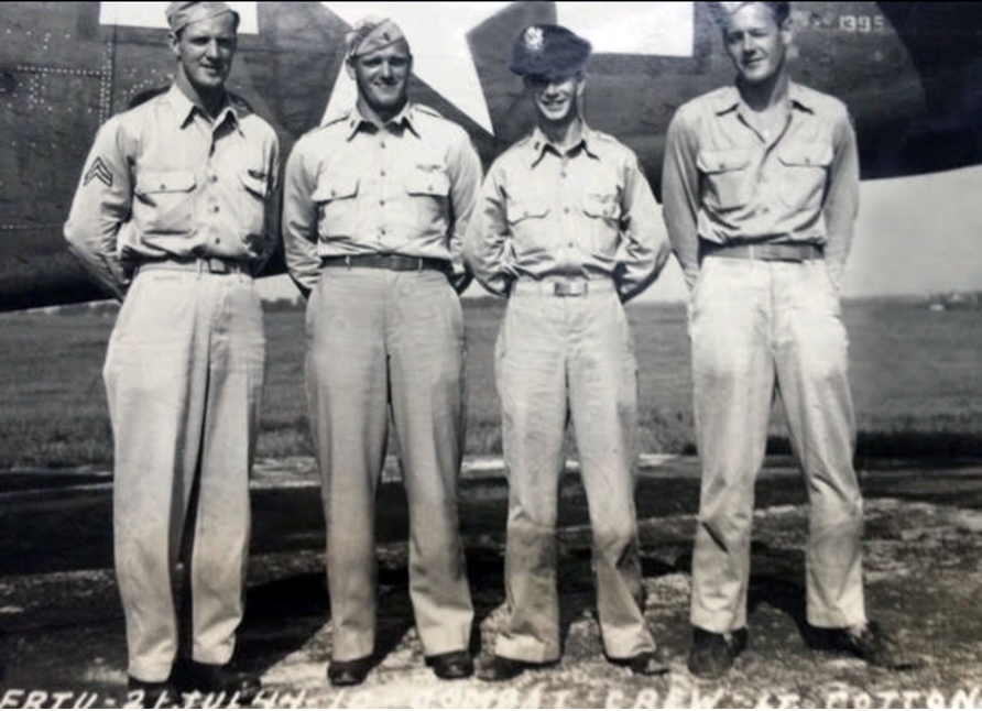 Staff Sgt. Loring E. Lord (far left) stands with fellow crew members