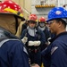 Sailors participate in a general quarters drill aboard USS Ronald Reagan (CVN 76)