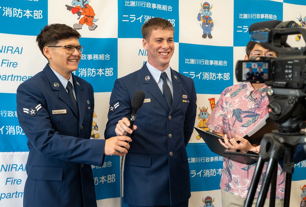 Through the fire: 18th MUNS Airmen save local national