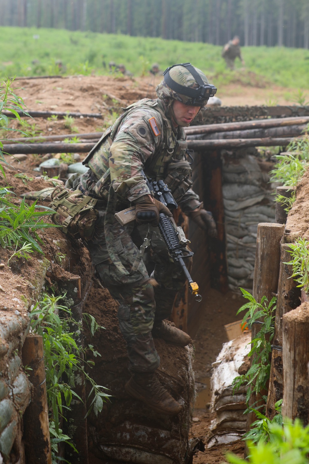 Michigan Army National Guard soldiers assault trenches at Exercise Baltic Viking