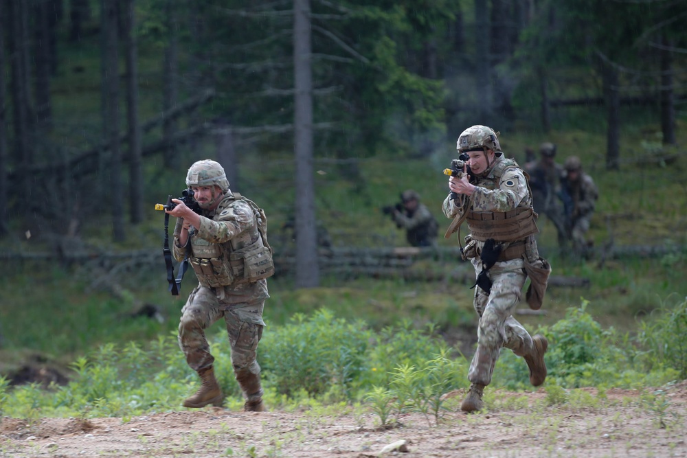 Michigan Army National Guard soldiers assault trenches at Exercise Baltic Viking