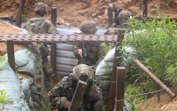 Michigan Army National Guard soldiers assault trenches at Exercise Baltic Viking