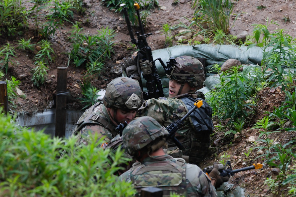 Michigan Army National Guard soldiers assault trenches at Exercise Baltic Viking