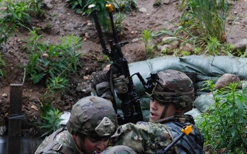 Michigan Army National Guard soldiers assault trenches at Exercise Baltic Viking