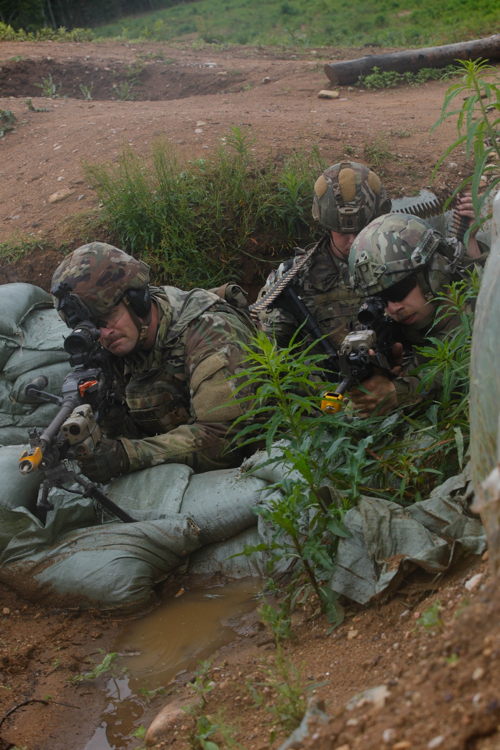 Michigan Army National Guard soldiers assault trenches at Exercise Baltic Viking