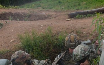 Michigan Army National Guard soldiers assault trenches at Exercise Baltic Viking