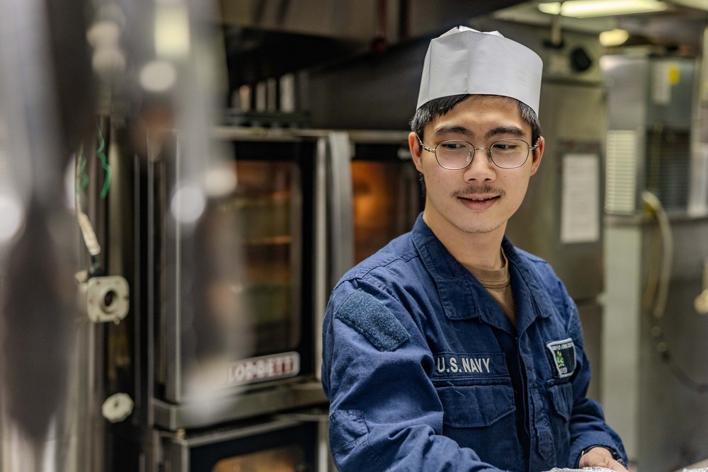 Culinary Specialists Prepare Dinner aboard USS Ralph Johnson