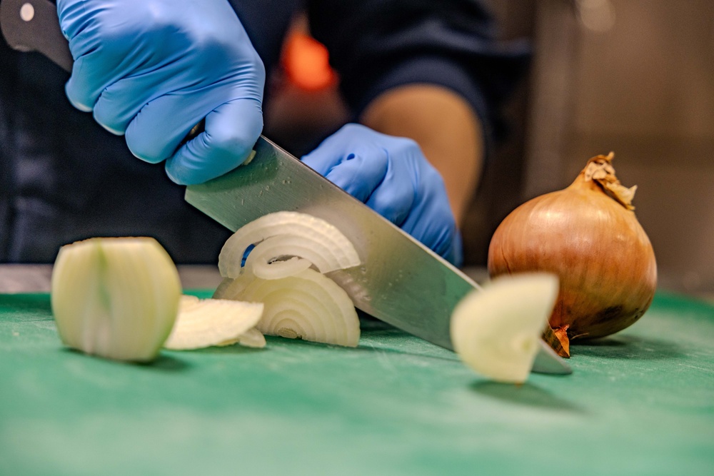 Culinary Specialists Prepare Dinner aboard USS Ralph Johnson