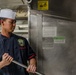 Culinary Specialists Prepare Dinner aboard USS Ralph Johnson