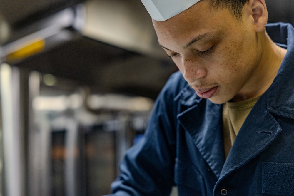 Culinary Specialists Prepare Dinner aboard USS Ralph Johnson