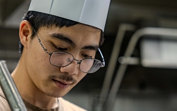 Culinary Specialists Prepare Dinner aboard USS Ralph Johnson