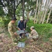 Service members and research staff set up rodent traps during biosurveillance at Talisman Sabre 2025