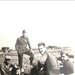 Staff Sgt. Loring E. Lord gathers with members of his aircrew