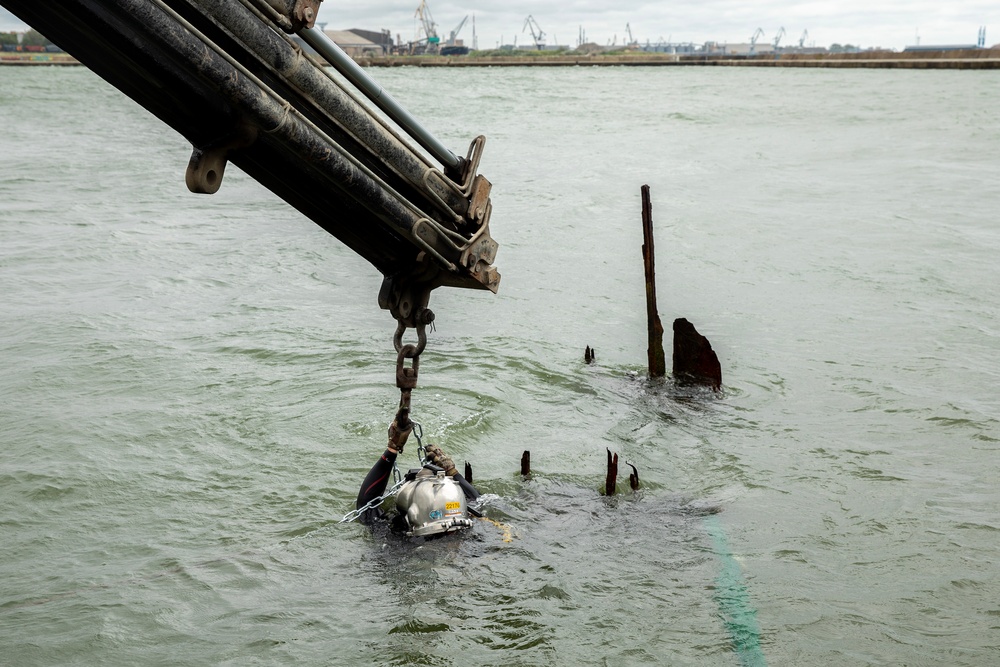 U.S. Navy Divers, Latvian Divers Remove Pylons During BALTOPS 25