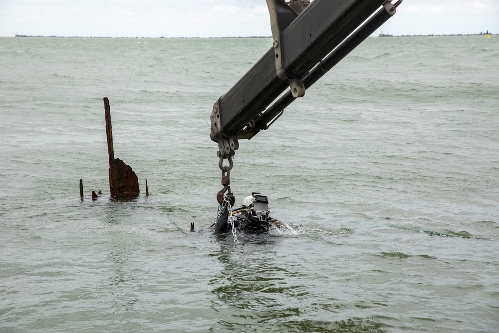 U.S. Navy Divers, Latvian Divers Remove Pylons During BALTOPS 25