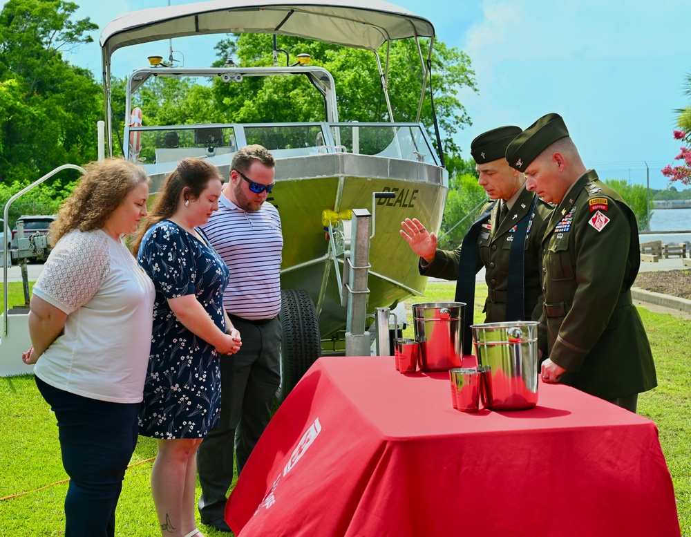 Chaplain prays over cups
