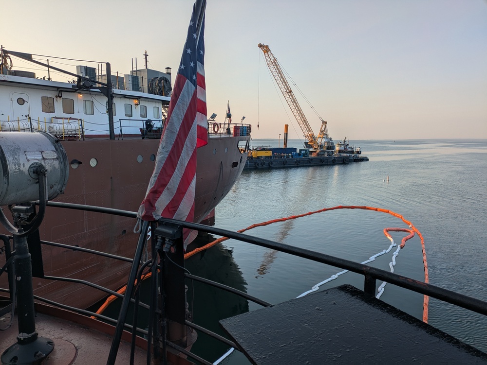 Hay Lake Marine Casualty responders strategically arrange containment and sorbent boom