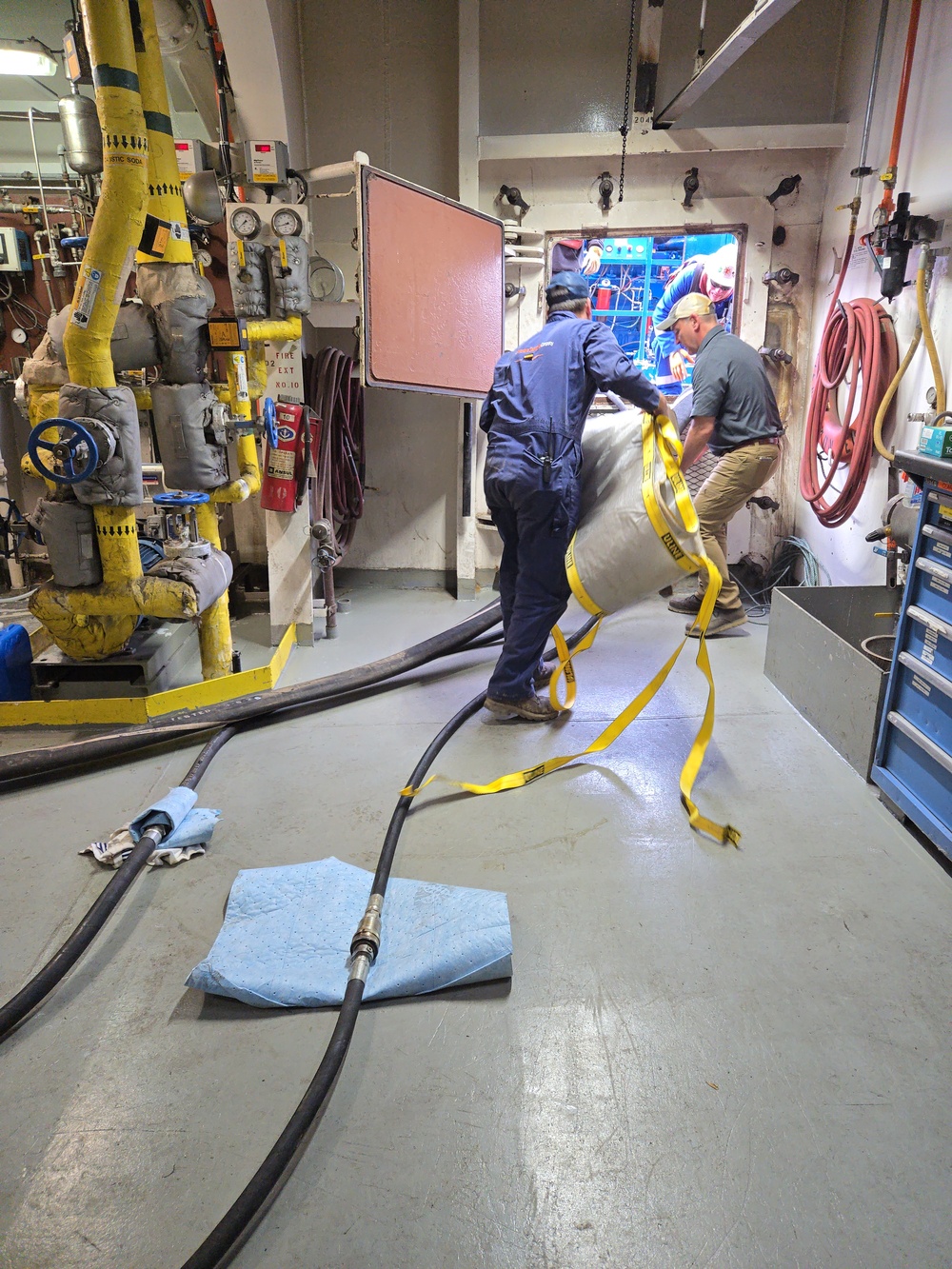 Responders to the Hay Lake Marine Casualty prepare the M/V Hon. James L. Oberstar for safe transit