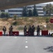 U.S. Marines, California Army National Guard stand watch at federal building