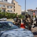 U.S. Marines, California Army National Guard stand watch at federal building