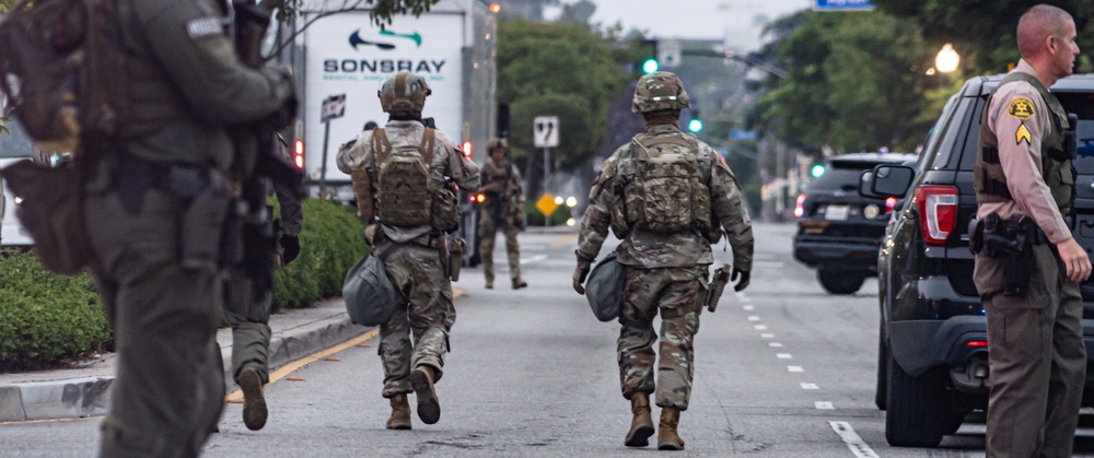 California National Guard Soldiers provide protection for federal law enforcement in federal operation