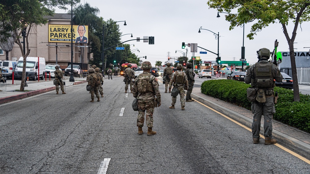 California National Guard Soldiers provide protection for federal law enforcement in federal operation