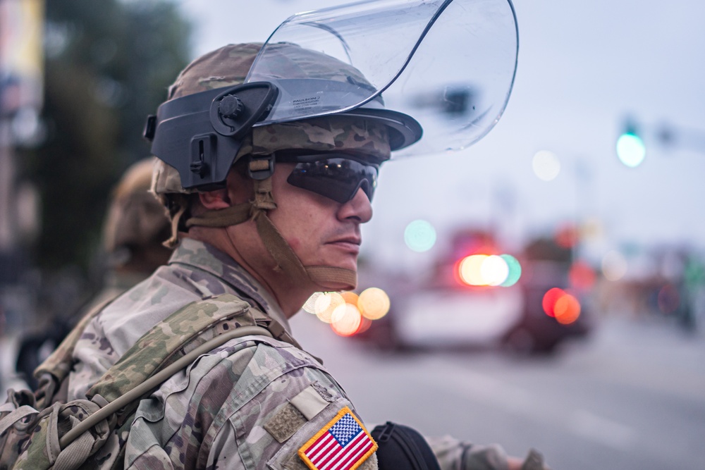 California National Guard Soldiers provide protection for federal law enforcement in federal operation