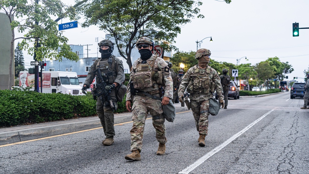 California National Guard Soldiers provide protection for federal law enforcement in federal operation