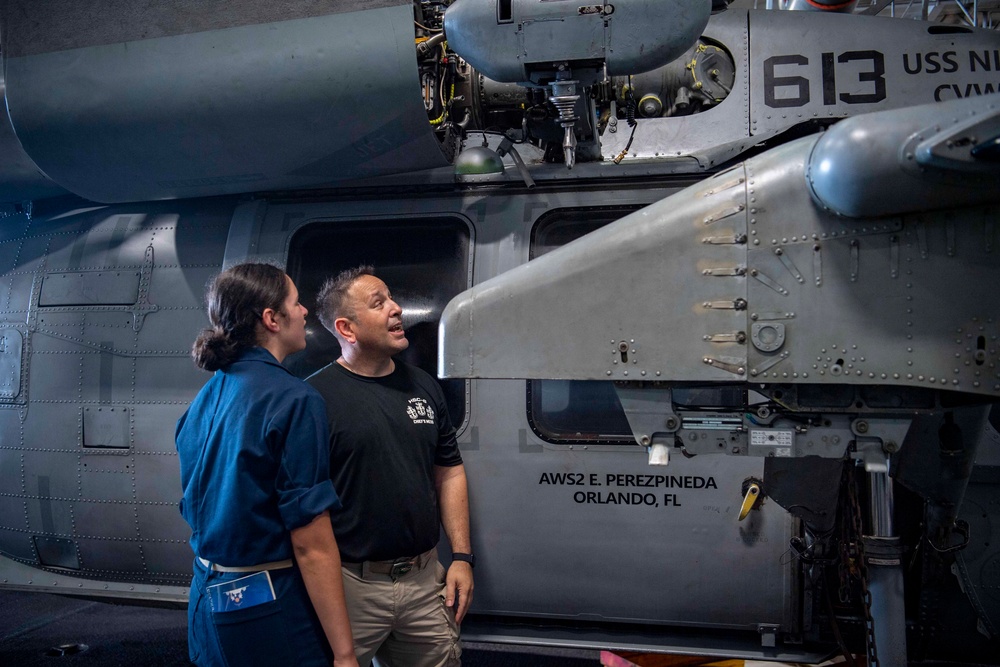 Father and Daughter Reunited Aboard the USS Nimitz