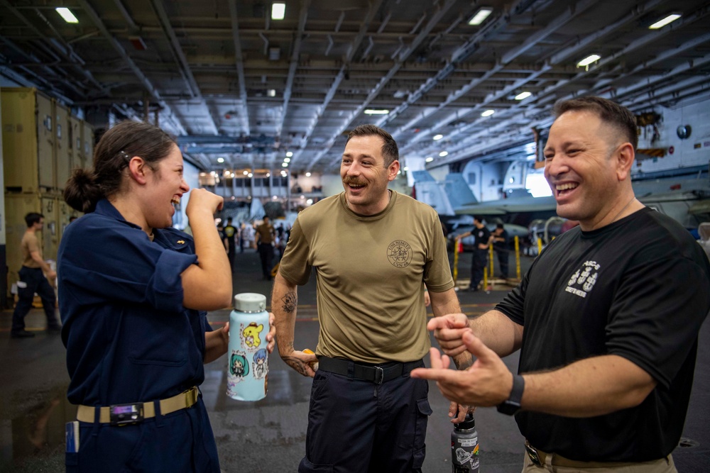 Father and Daughter Reunited Aboard the USS Nimitz