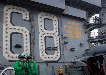 Father and Daughter Reunited Aboard the USS Nimitz