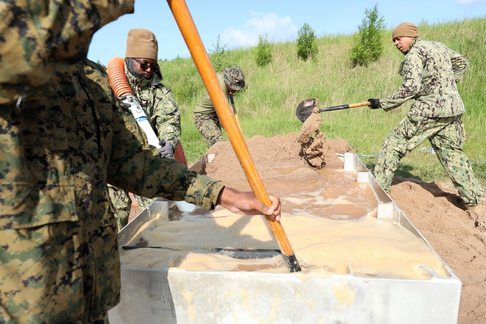 U.S. and Latvian Forces Install Submatt Road System - BALTOPS 25