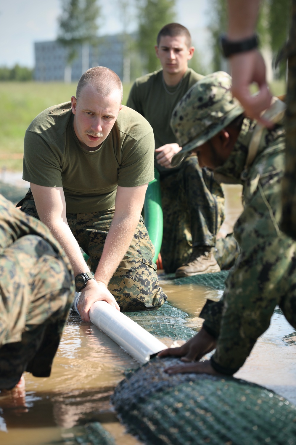 U.S. and Latvian Forces Install Submatt Road System - BALTOPS 25