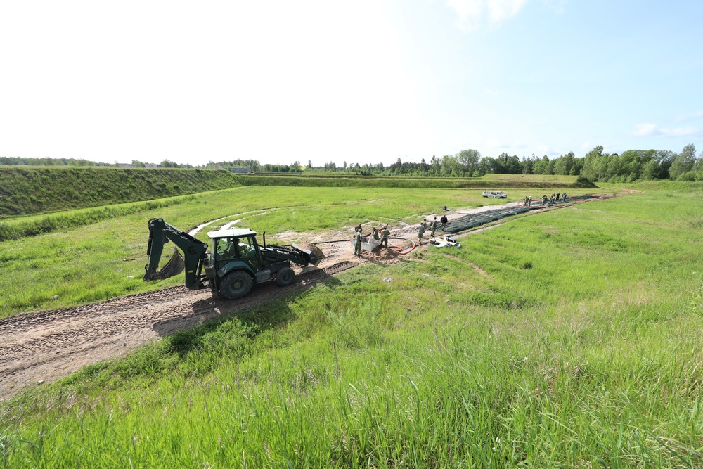 U.S. and Latvian Forces Install Submatt Road System - BALTOPS 25