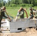 U.S. and Latvian Forces Install Submatt Road System - BALTOPS 25