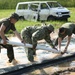 U.S. and Latvian Forces Install Submatt Road System - BALTOPS 25