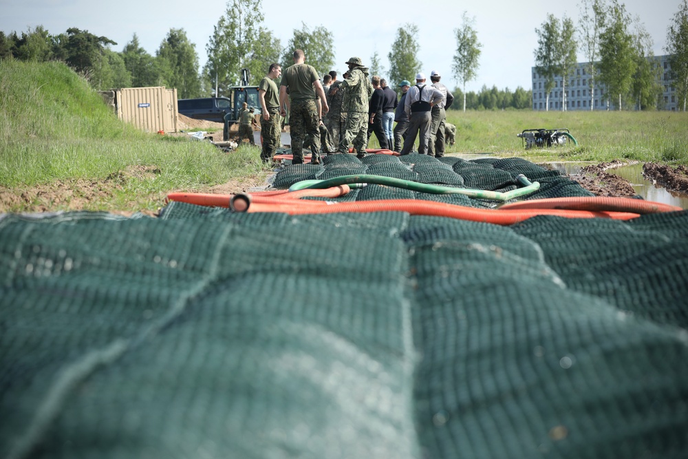 U.S. and Latvian Forces Install Submatt Road System - BALTOPS 25