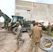 Marines and Latvian Engineers Cut Lumber for Trench Support - BALTOPS 25