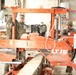Marines and Latvian Engineers Cut Lumber for Trench Support - BALTOPS 25