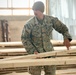 Marines and Latvian Engineers Cut Lumber for Trench Support - BALTOPS 25
