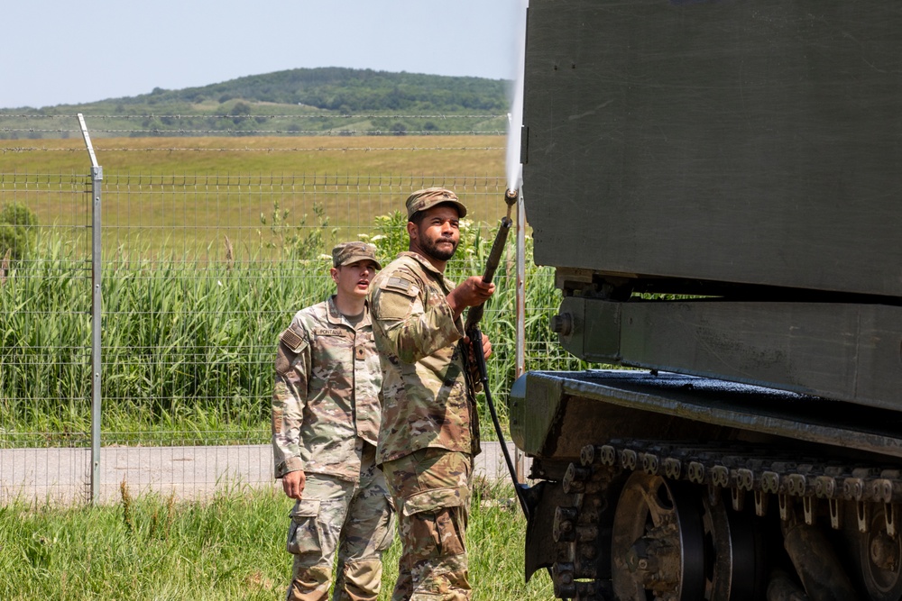 41st FAB washes down MLRS before transportation procedures during Saber Guardian 25