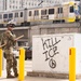 Soldiers of the 1st Battalion, 185th Infantry Regiment provide protection to a federal building