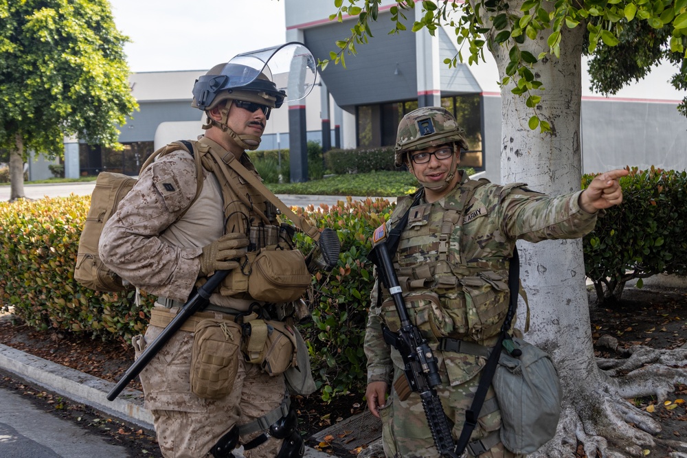 U.S. Marines guard federal building to assist California Army National Guard