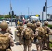 U.S. Marines, California Army National Guard stand watch at federal building