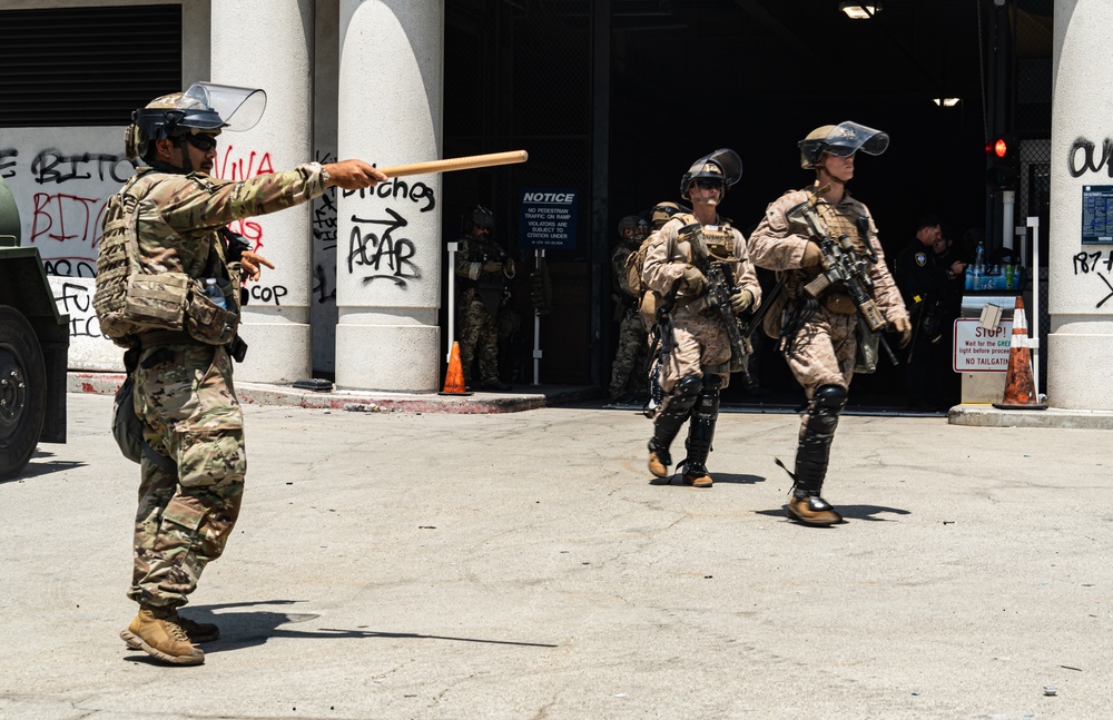 U.S. Soldiers and Marines protect federal facility